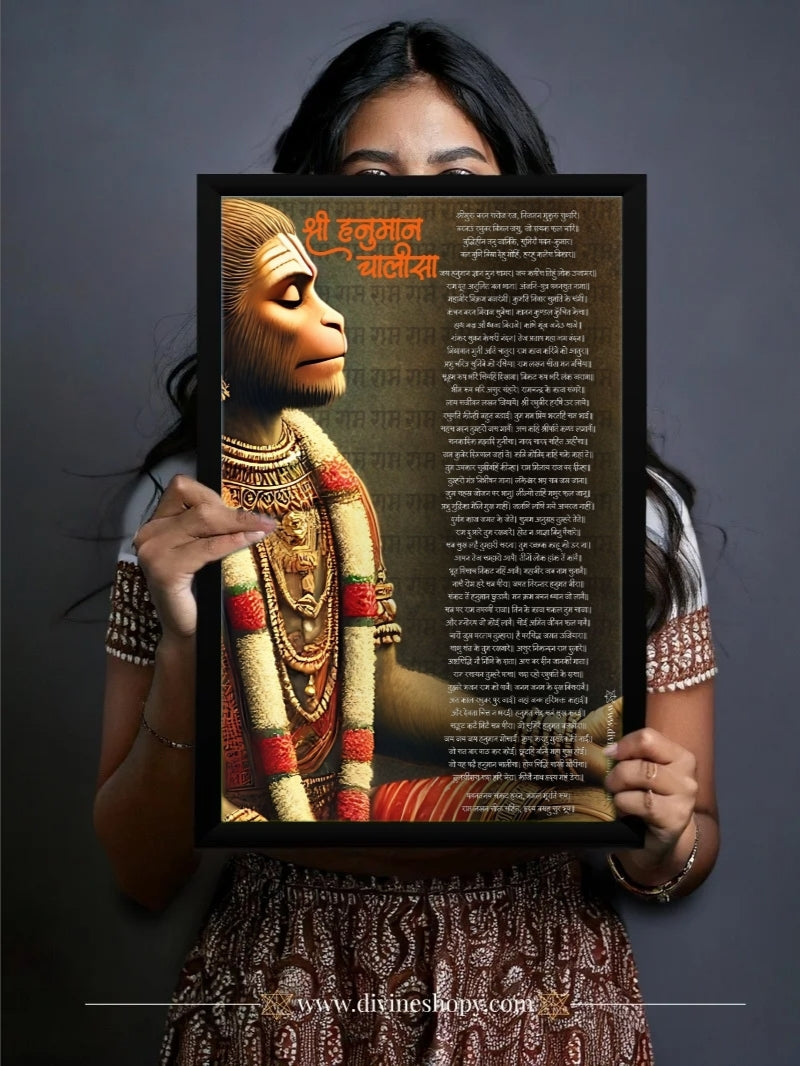 A person holding a framed Hanuman Chalisa Wall Art, showcasing the high-quality print, clear text, and premium black frame. Ideal for gifting and home decor.